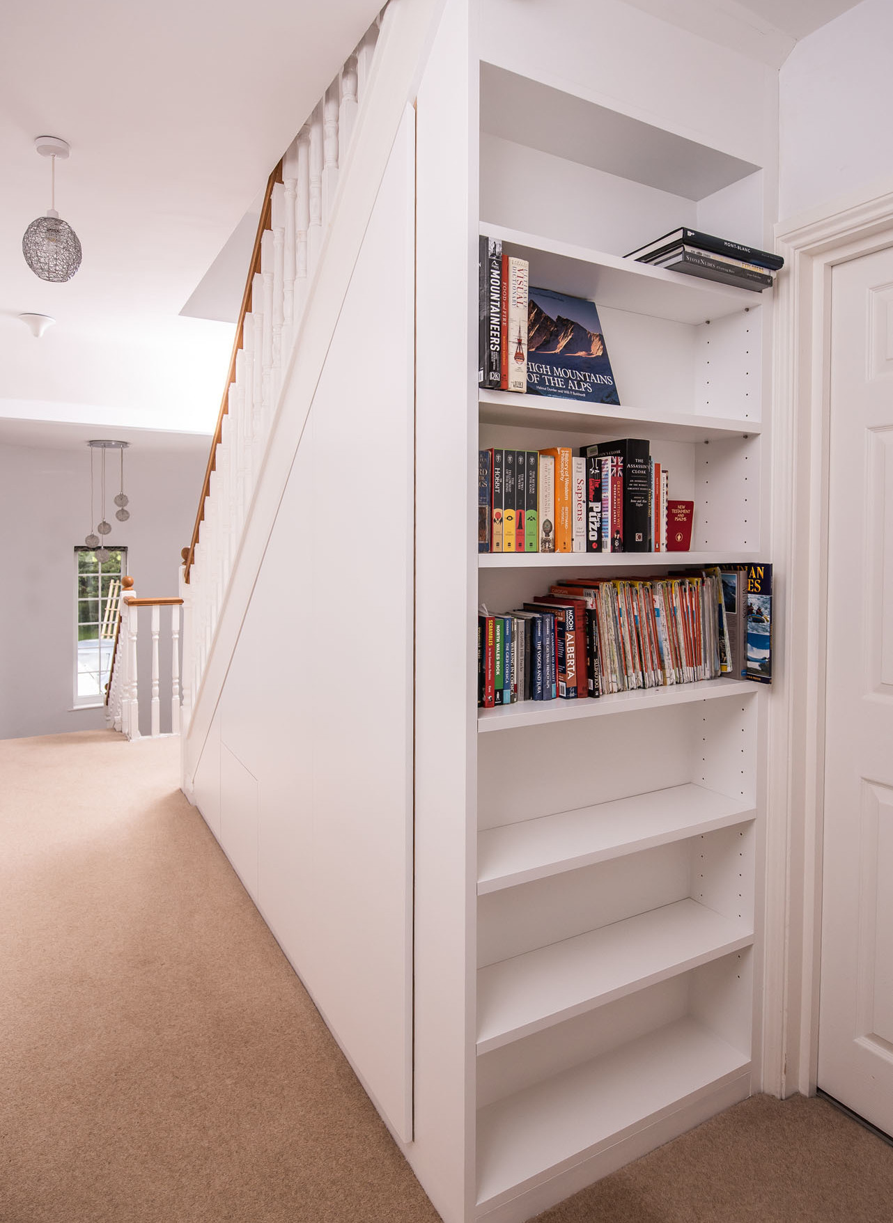 white bookcase unit attached to staircase hemel hempstead